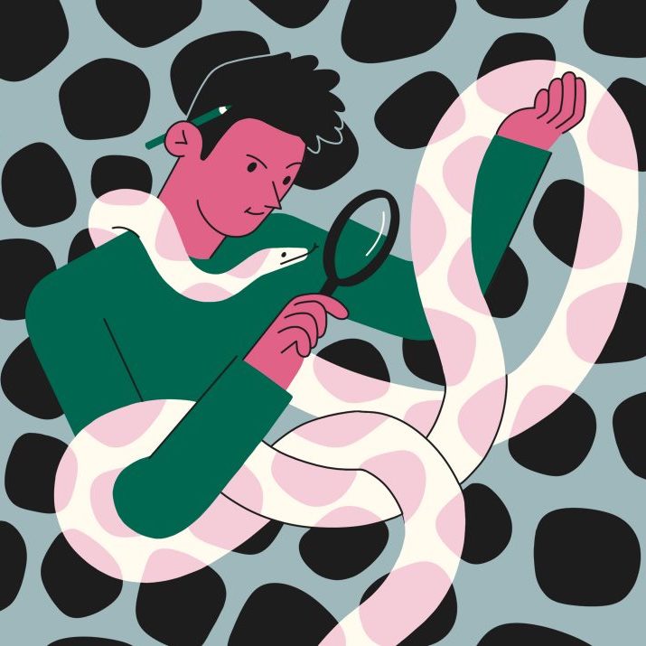 Image of person looking through magnifying glass at a python snake. Image for Python Developers Salaries around the World article.